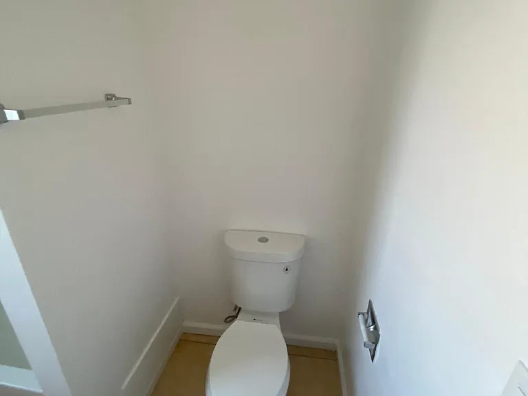 Toilet in bathroom at Edison Apartments in Burbank, California.