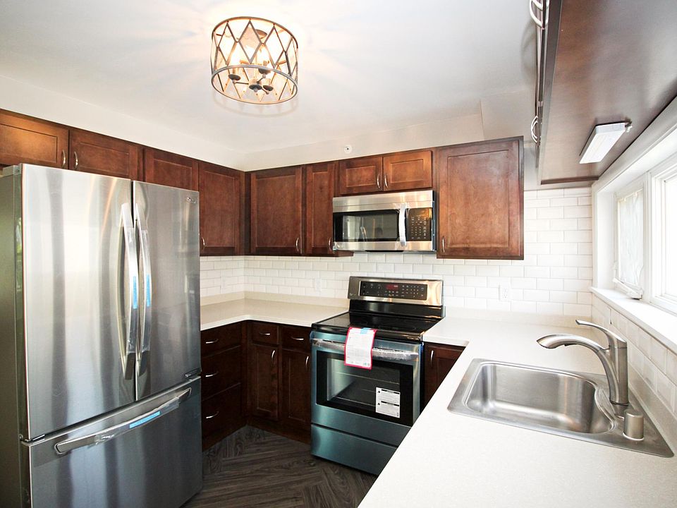 Fully renovated kitchen with tile backsplash and LG applianc
