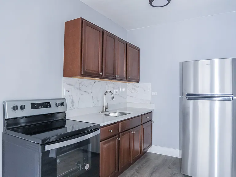 6956 N Ashland Blvd #306 — Photo 1