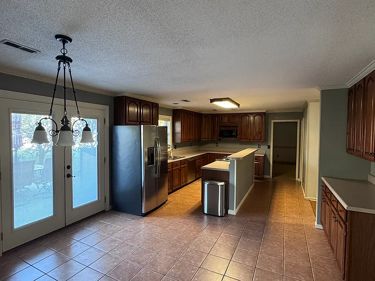 7712 Windwood Dr — Photo 3