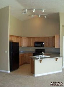 Kitchen with Vaulted Celings