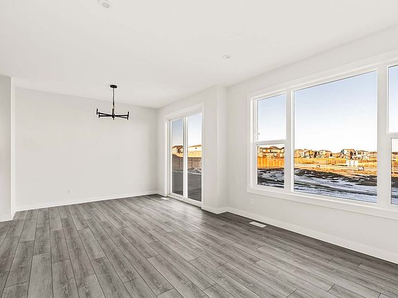 A quick possession home by Brookfield Residential in Creekstone located at 207 Creekstone Circle SW.