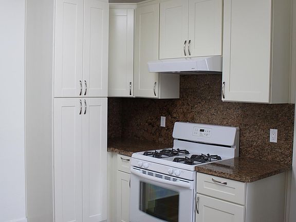 Kitchen, opposite side, with granite counter tops and gas ra