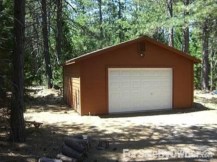 Detached Garage
						:
						Additional 2 car detached garage/shop with power.