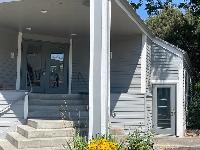 Entrance to clubhouse, just a few steps away from 7437 Singing Hills. Location of mailboxes, too.