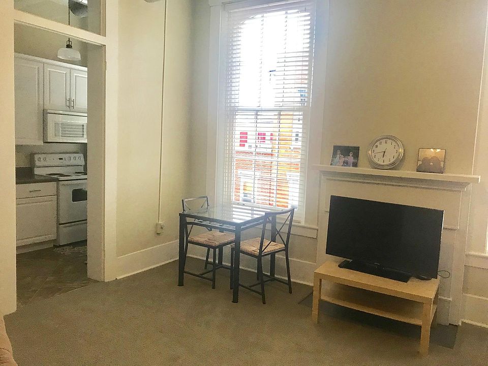 Living room looking into kitchen