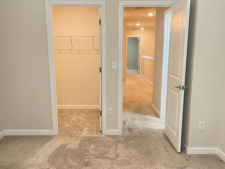 bedroom 2 with spacious walk-in closet