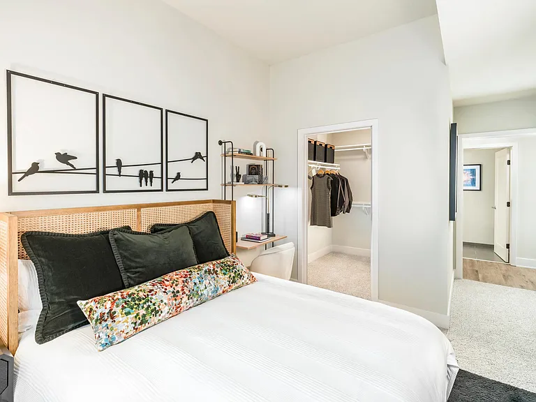 Enjoy a calming retreat with plush carpet, designer touches, and a spacious walk-in closet designed to keep life effortlessly organized.