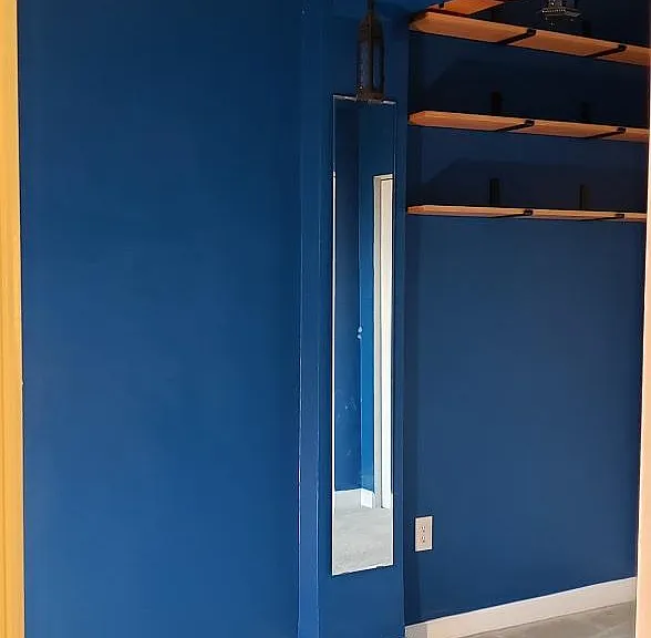 Full length mirror in bedroom. New carpet installed 2023.