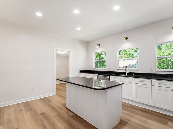 Kitchen with door to laundry room
