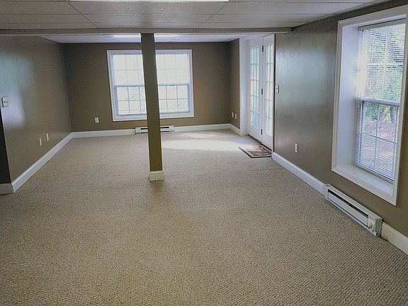 Same living area shown unfurnished to illustrate actual layout and size