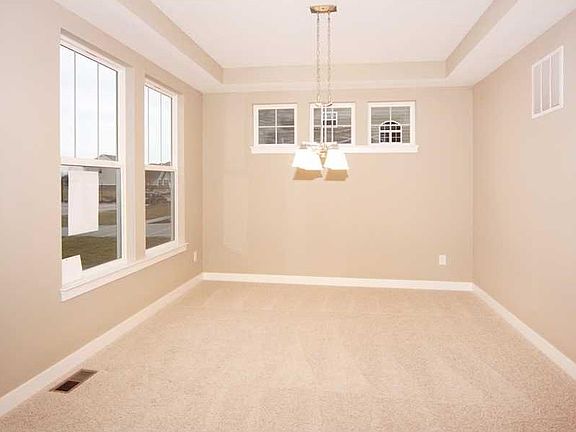 Model photo of same home. Please check construction stage of