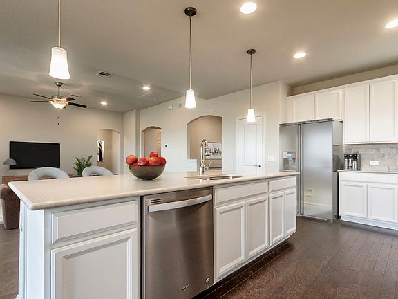 Large island overlooking gathering room