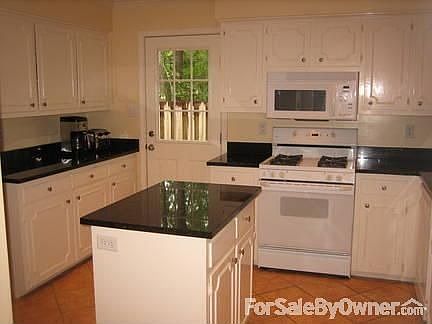 Kitchen
						:
						Separate outdoor access, window, access to dining room and living room.