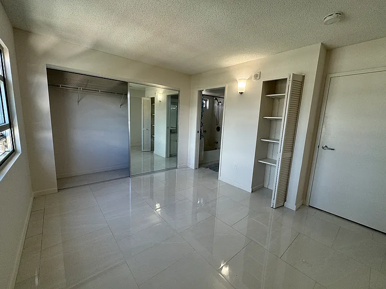Primary bedroom with private bathroom