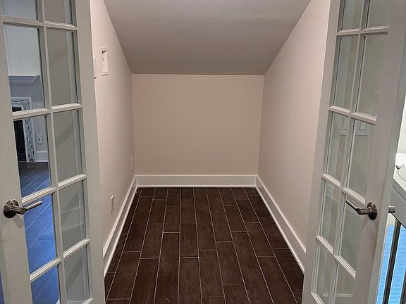 Closet at the top of stairs - converted to additional workspace or storage.