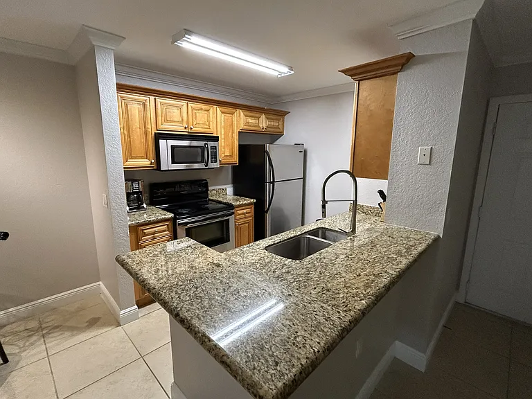 8926 Manor Loop #102 — Photo 14