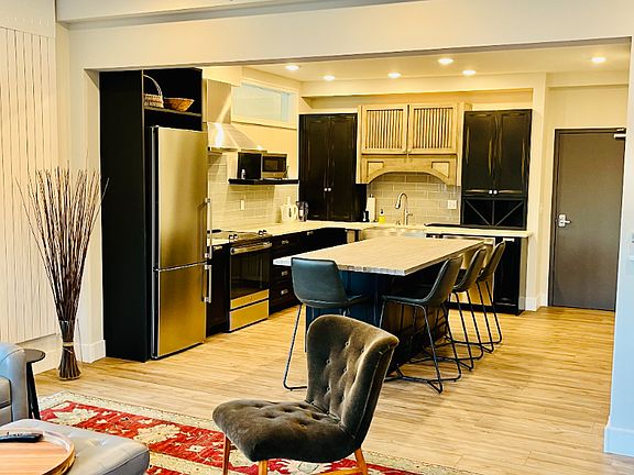 Well appointed kitchen with a spacious island for dining.