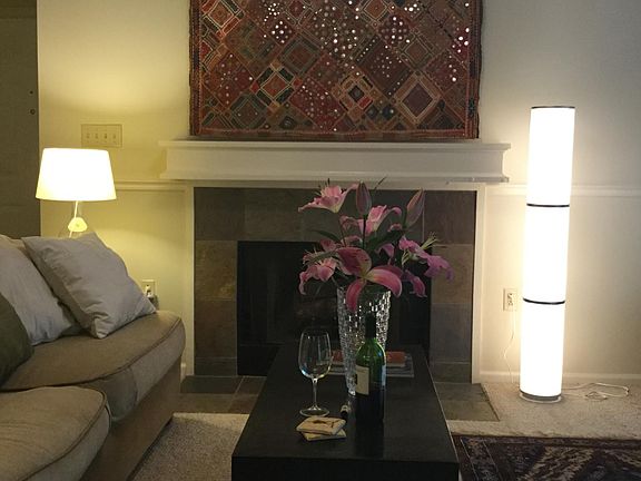 The living area has plenty of soft lighting.