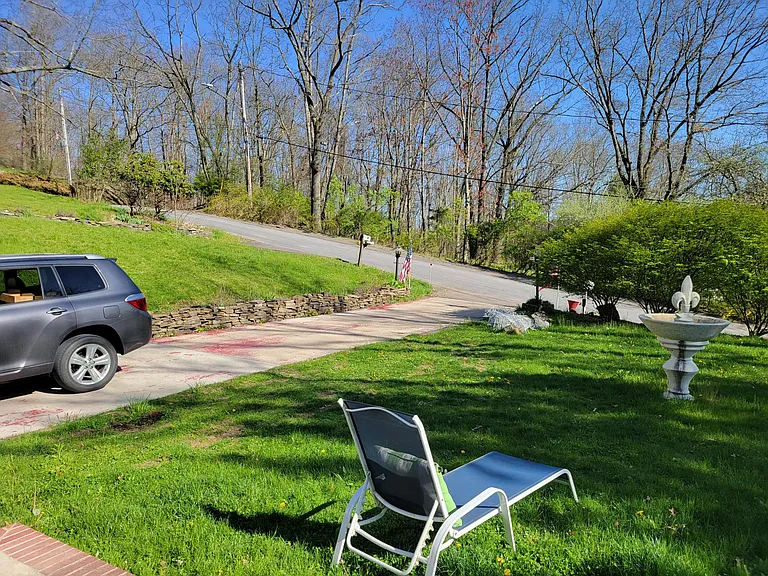 Front yard - top driveway (also a lower driveway). Lots of bunnies.