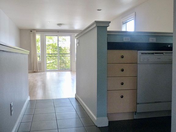 tiled entry, hardwood floor