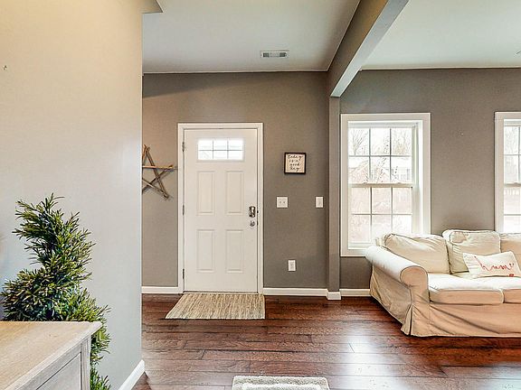 Spacious Entry Foyer opens into a comfy Seating Room.
