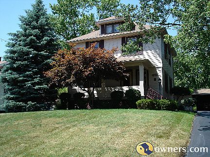 A view of home from the sidewalk.