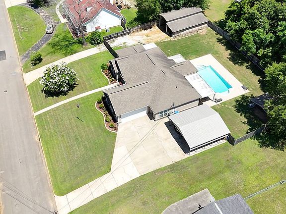 2 driveways, large carport