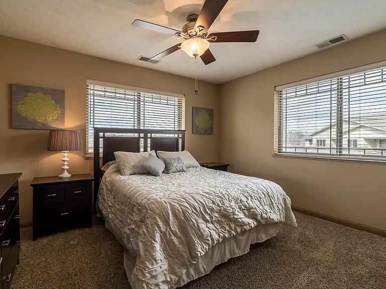 Spacious bedrooms with ceiling fans for added comfort throughout the year.