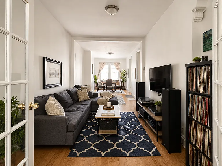 traditional living room leading to the dining area