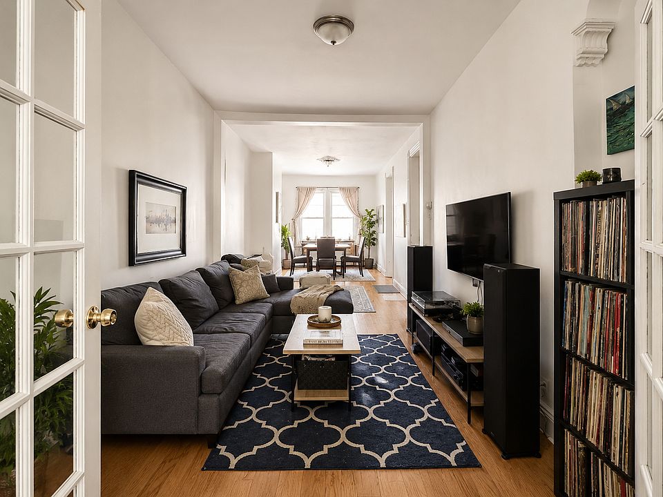 traditional living room leading to the dining area