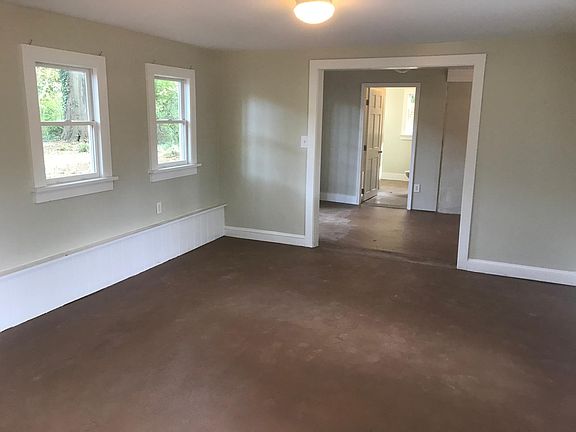 Living Room With A View of the Kitchen