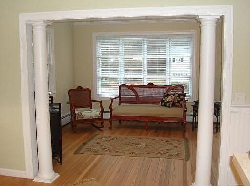 Living Room (hardwoods,columns,crown molding)