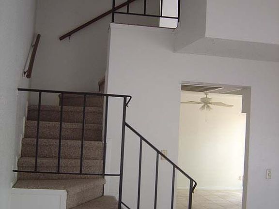 These walls have been painted Brown Bread, plus modern light fixtures