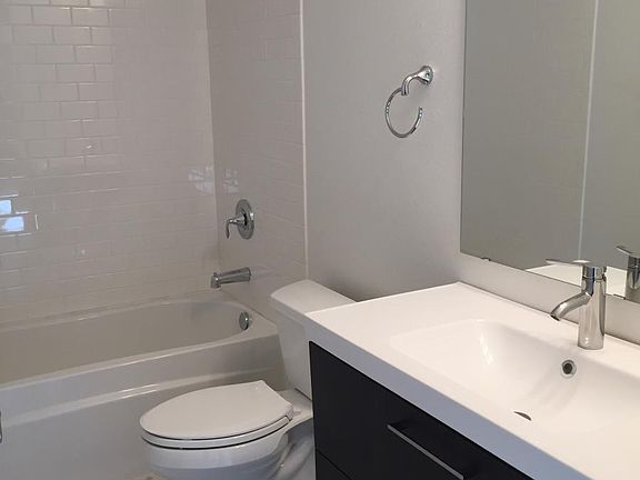 Second full bath, subway tile bath and hexagon mosaic floor