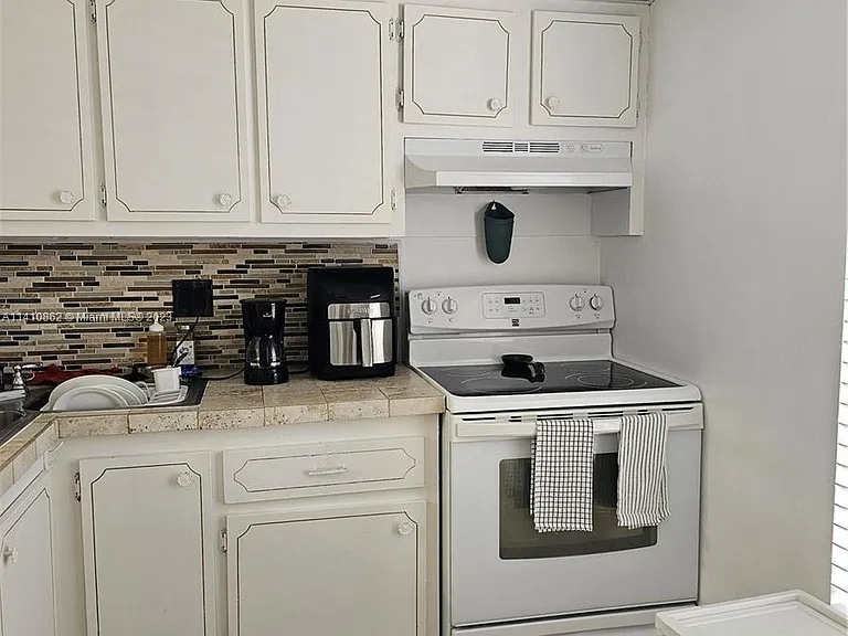 6150 NW 62nd St #307 — Photo 12