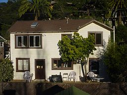 Rear of house with sunny back deck