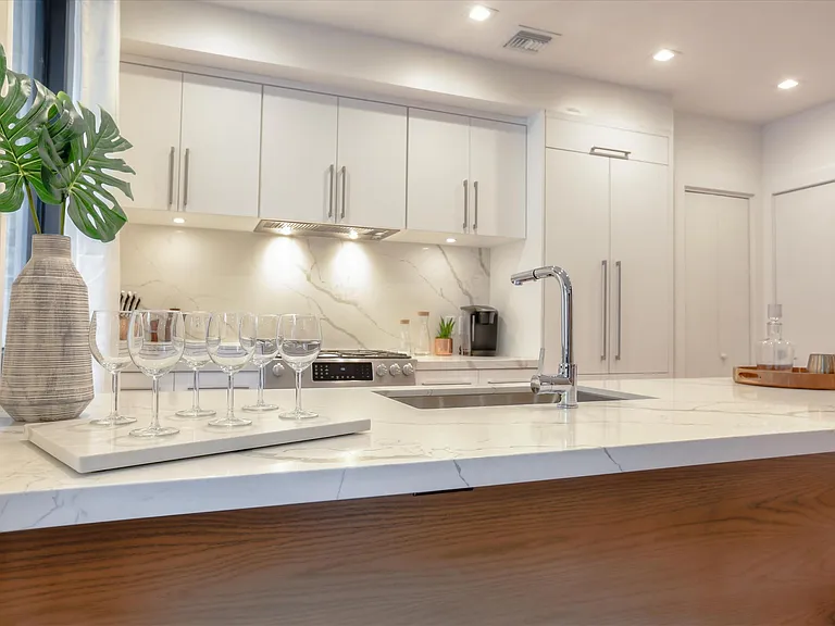 The kitchen is equipped with all of the essentials including cookwear, diningwear and silverware.