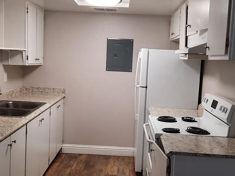 2x1 kitchen appliances may be white, black or black/stainless steel. Some are glass top stoves some coiled.