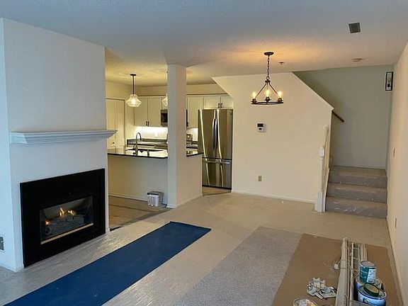 Dining space next to kitchen - new lighting throughout
