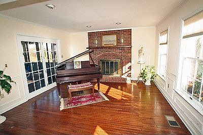 Music Room opens to screened porch