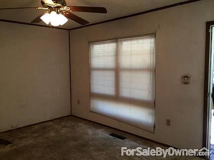entry/living room
						:
						front of house-large front window