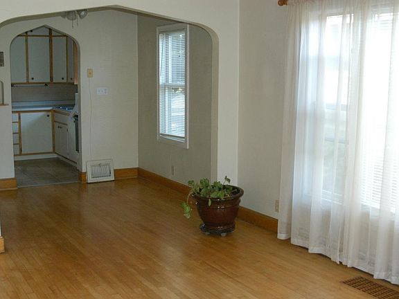 Bird's eye maple hard wood flooring in living and dining roo