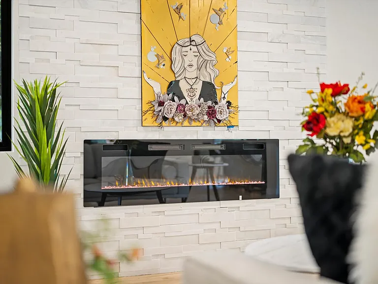 Electric Fireplace with blower that emits heat