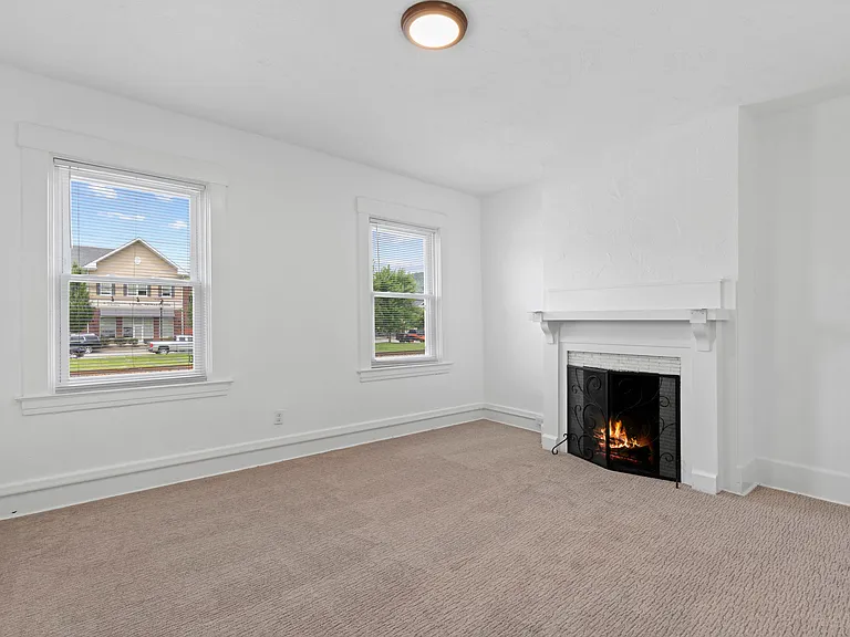 Decorative Fireplace in the Primary Bedroom.