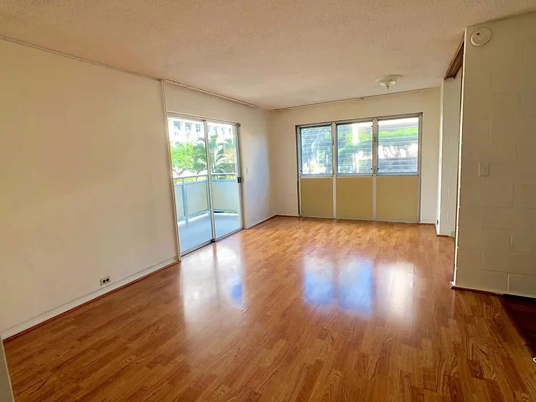 Living Area with lanai overlooking park area and University Ave.