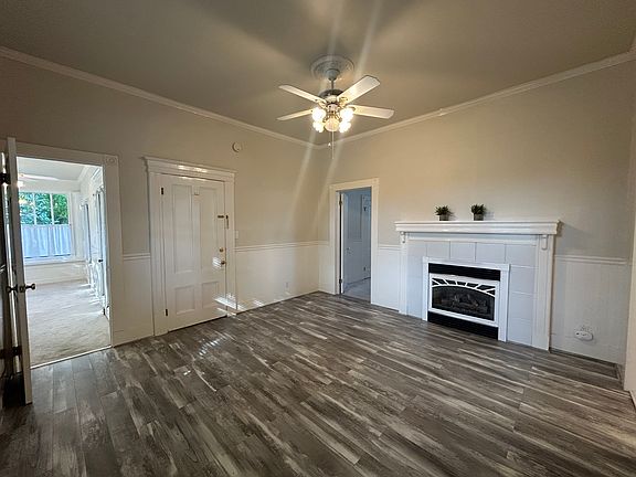 Living room looking back to the front door and bedrooms