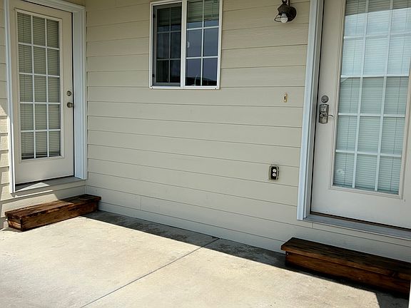 Back Patio ( a door off of the kitchen and a door off of the master bedroom.