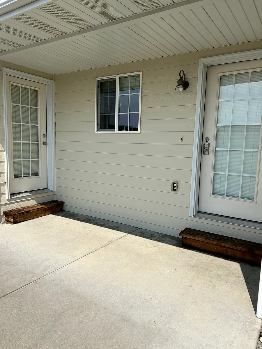 Back Patio ( a door off of the kitchen and a door off of the master bedroom. - 3134 New Hope Dr