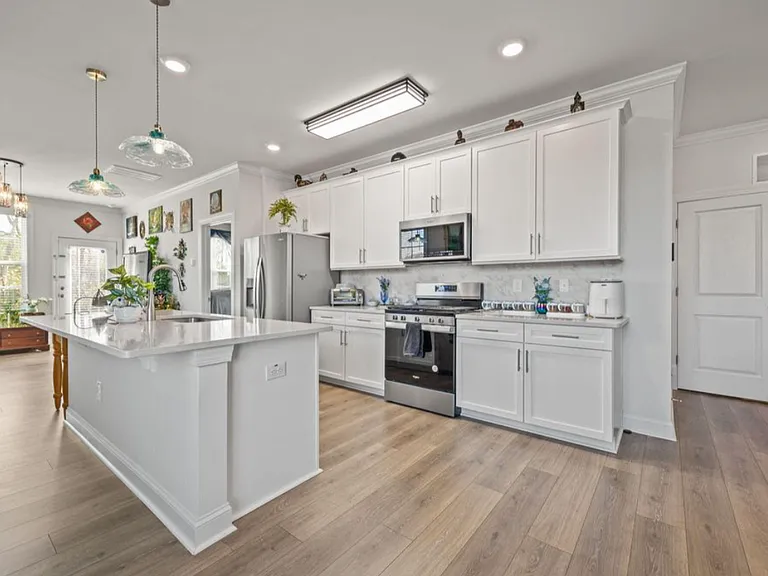 Very open kitchen with lots of natural light and modern features and appliances! New light fixtures installed.